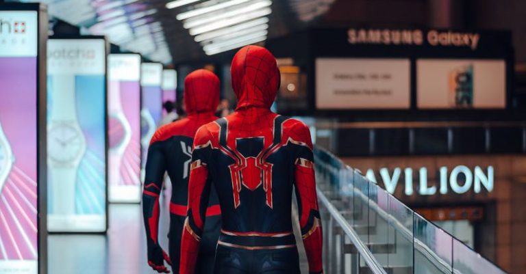 Cosplay Costumes - People Wearing Spider-man Adult Costume Walking on Train Station