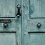 Corrosion Resistance - Vintage blue door of old building