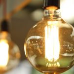 Energy Efficiency - Lighted Light Bulb in Selective-focus Photography