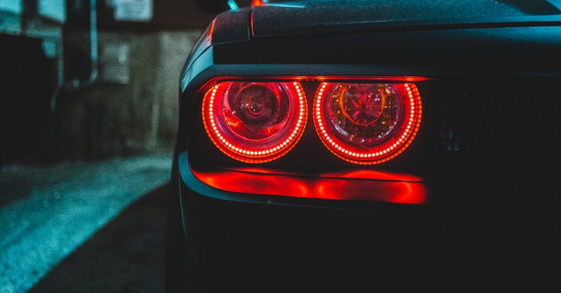 Construction Speed - Red headlight on black car