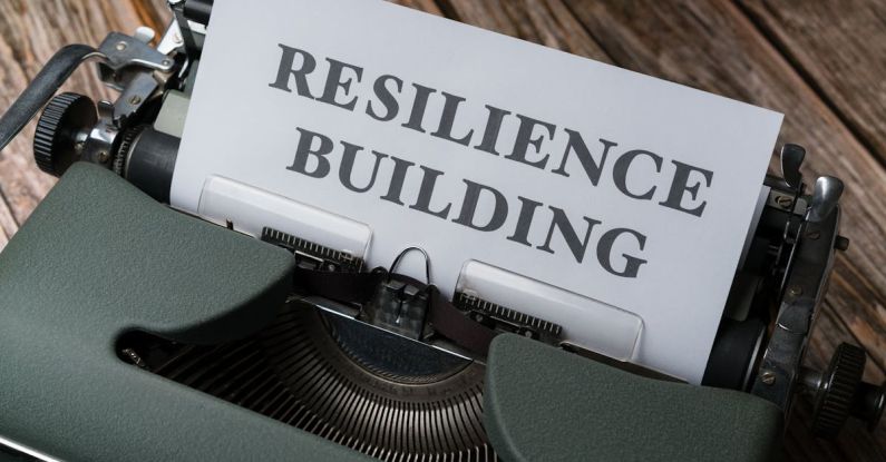 Disaster Resilience - A typewriter with the word resilience building on it