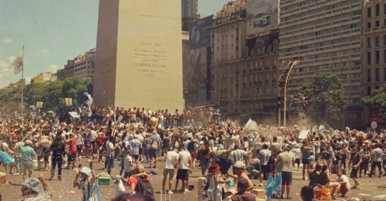 Dynamic Facades - Vintage Image of a Crowd Celebrating by a Monument