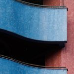 Eco-architecture - A close up of a blue and red building